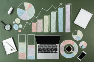 top view of laptop and business charts with cup of 2023 11 27 05 28 46 utc